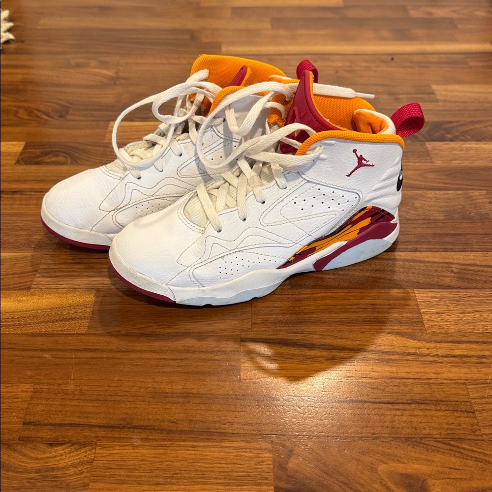 Jordan’s White and Red High-Top Sneakers
